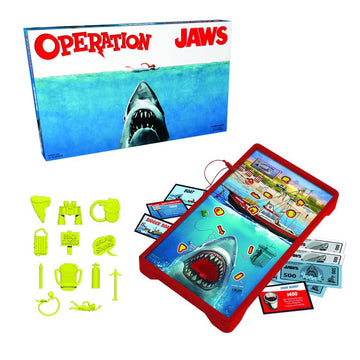 Operation Jaws game set with components and packaging featuring a shark image.